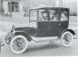 Original Ford Sedan Add photo showing light tires